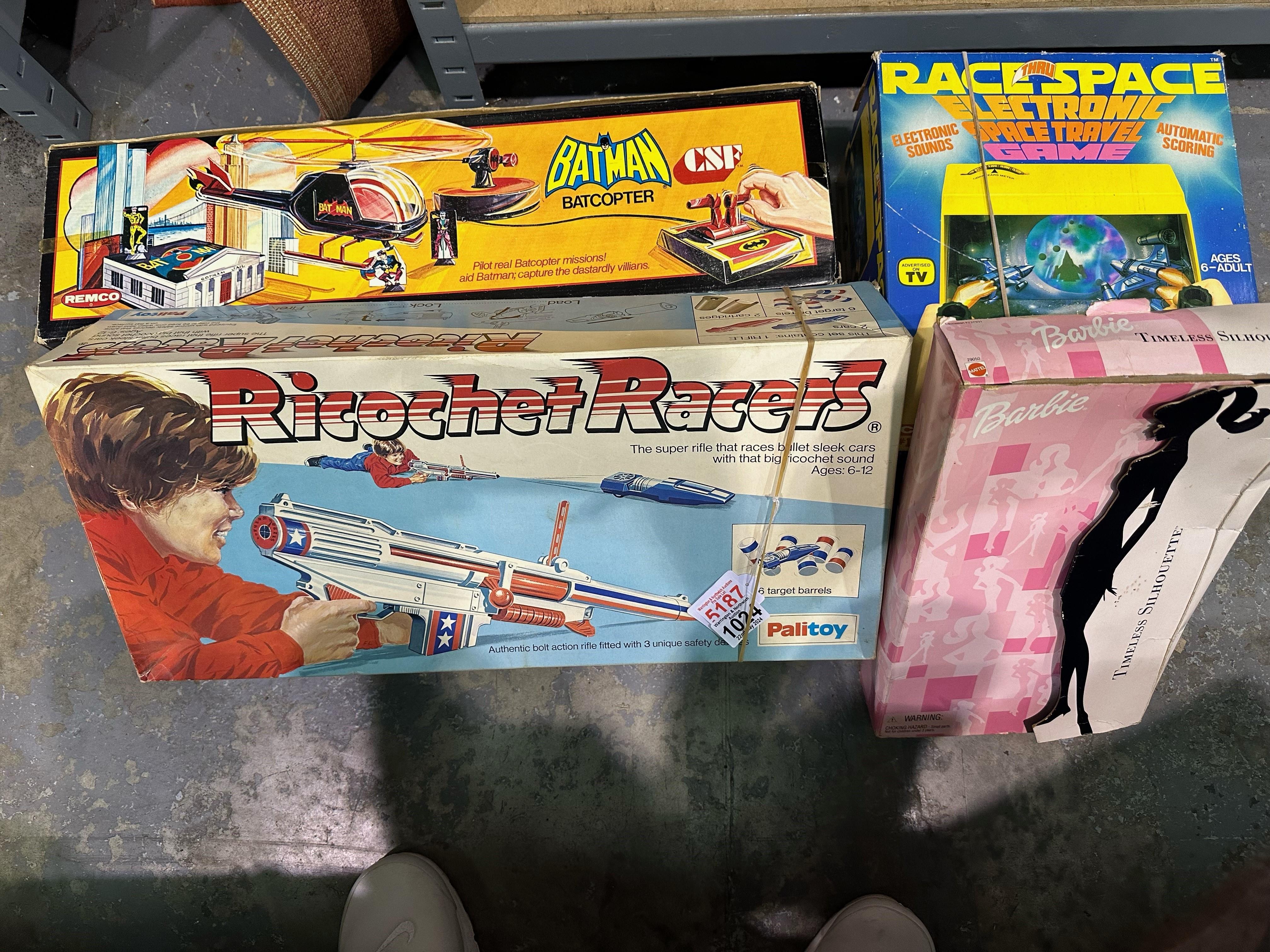 Three boxed board games to include Ricochet Racers, Batman bat copter ( missing parts), Race space