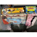 Three boxed board games to include Ricochet Racers, Batman bat copter ( missing parts), Race space