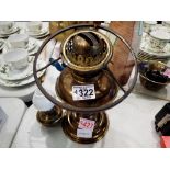 Two oil burning brass lamps. Not available for in-house P&P