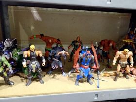 Fourteen 200X He Man figures from early 2000's, some complete and one vehicle. Not available for