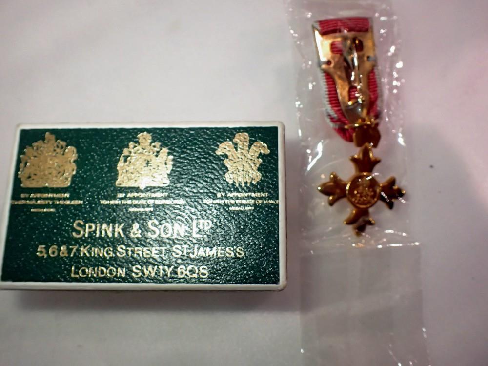 Spink & Co, miniature OBE medal in original box. UK P&P Group 1 (£16+VAT for the first lot and £2+