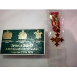 Spink & Co, miniature OBE medal in original box. UK P&P Group 1 (£16+VAT for the first lot and £2+