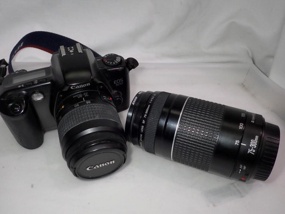 Canon EOS 500 SLR camera with zoom lenses 35 to 80 and 75 to 200. UK P&P Group 2 (£20+VAT for the
