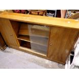Sideboard with sliding glass doors and shelves. Not available for in-house P&P