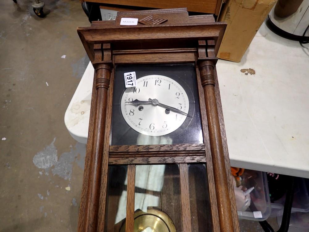 Oak chiming clock with pendulum. Not available for in-house P&P