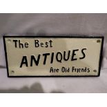 Cast iron sign The Best Antiques Are Old Friends, L: 24 cm. UK P&P Group 1 (£16+VAT for the first