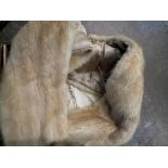 Light brown fur stole in original Lewis box. Not available for in-house P&P