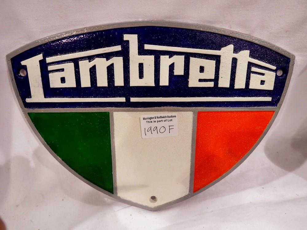 Cast iron Lambretta wall plaque sign, W: 28 cm. UK P&P Group 2 (£20+VAT for the first lot and £4+VAT