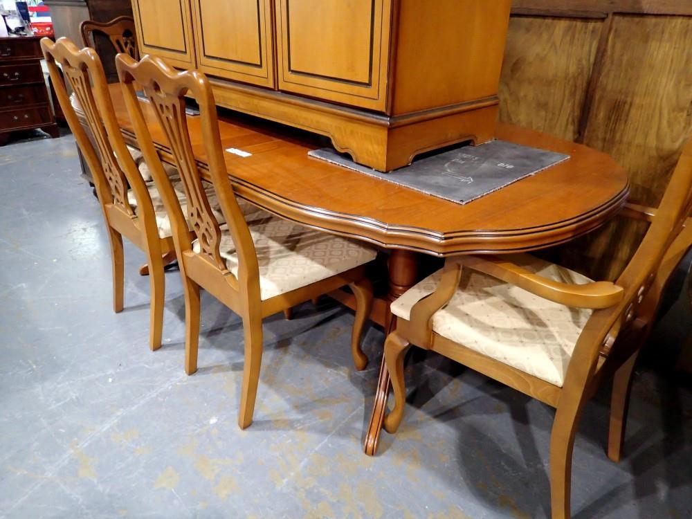 Cherry wood dining table with 4+2 chairs. Not available for in-house P&P