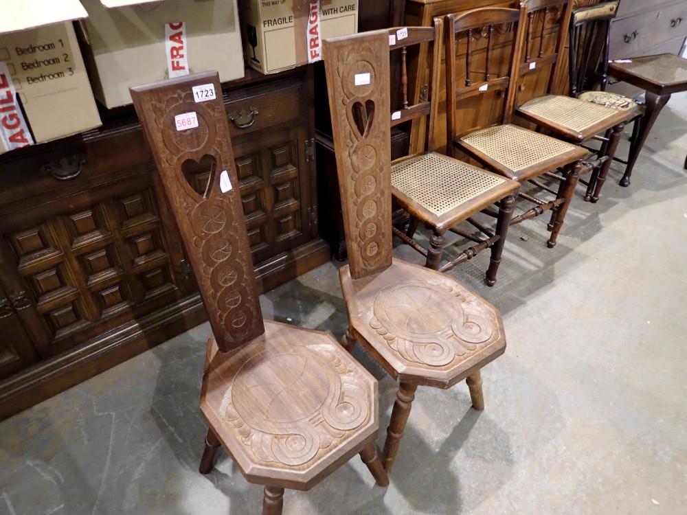 Pair of oak carved chairs. Not available for in-house P&P