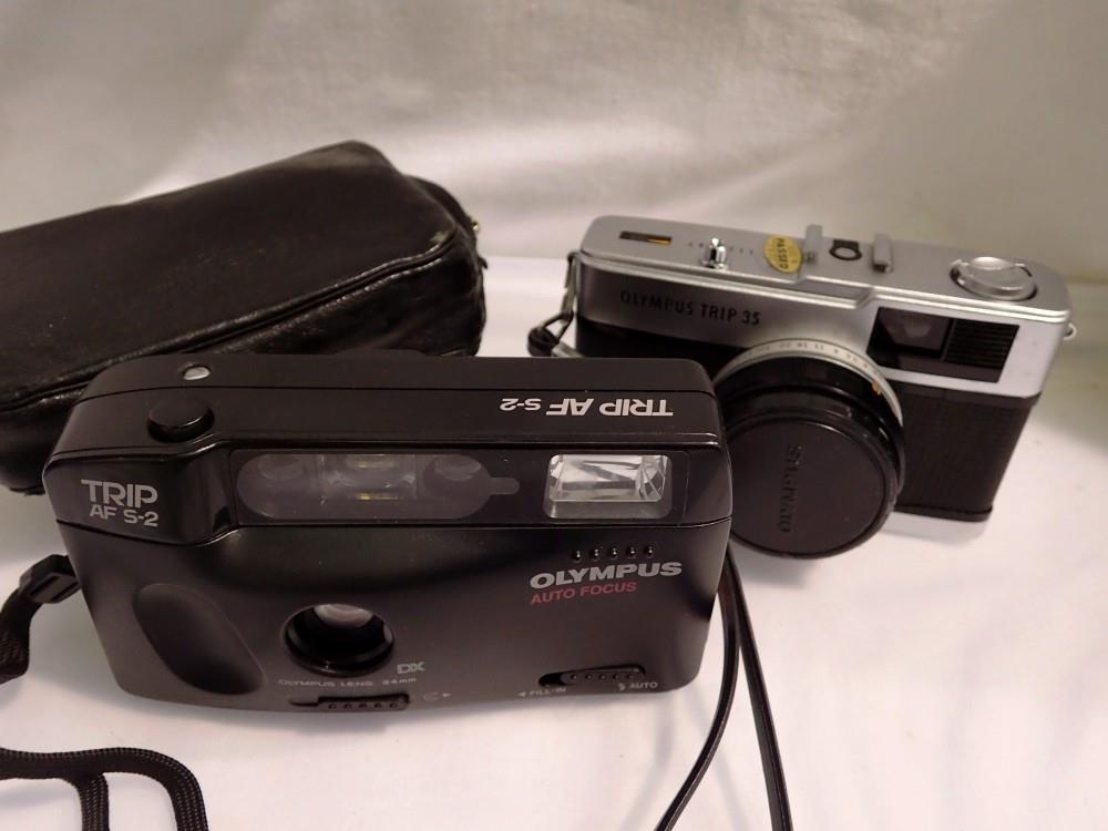 Two Olympus trip cameras. UK P&P Group 1 (£16+VAT for the first lot and £2+VAT for subsequent lots)