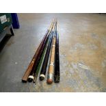 Four snooker cues and two piece fishing rod. Not available for in-house P&P