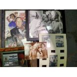 Three framed pictures, loose postcards and a 007 film reel. Not available for in-house P&P