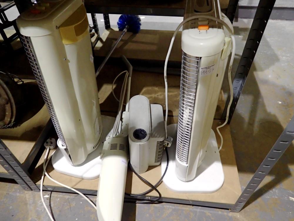 Two halogen heaters and a fan heater together with a Bissell magic broom. All electrical items in