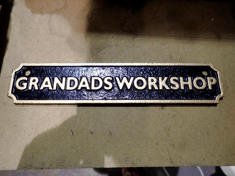 Cast iron Grandads workshop sign. W:18cm. UK P&P Group 1 (£16+VAT for the first lot and £2+VAT for