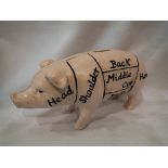 Cast iron piggy bank. L:15cm. UK P&P Group 2 (£20+VAT for the first lot and £4+VAT for subsequent