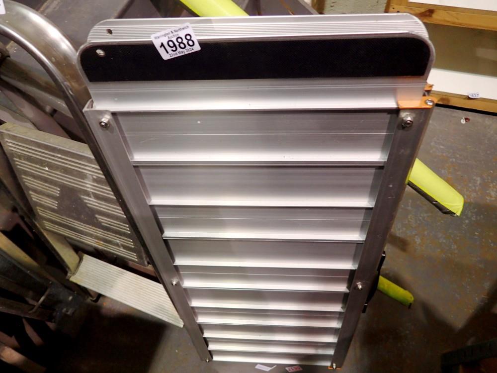 Metal folding ramp. Not available for in-house P&P