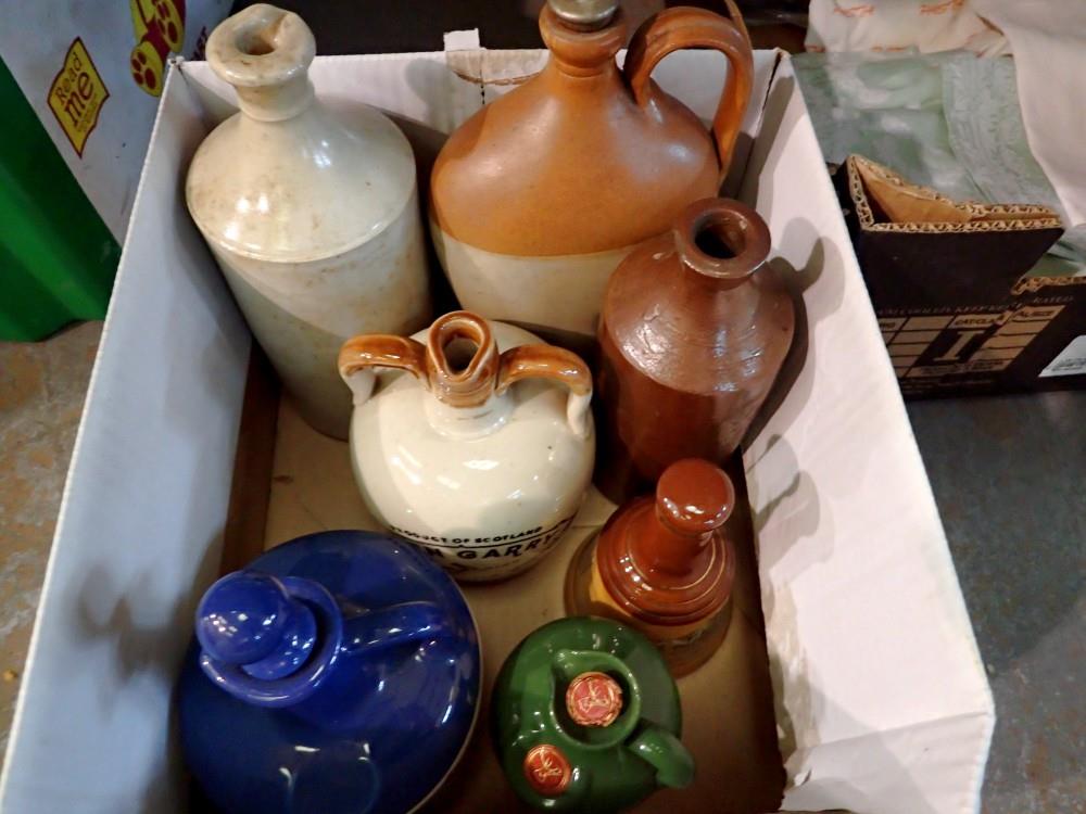 Seven mixed stoneware jugs. Not available for in-house P&P