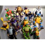 Eleven Teenage Mutant Ninja Turtles playmates loose figures to include an original Shredder,