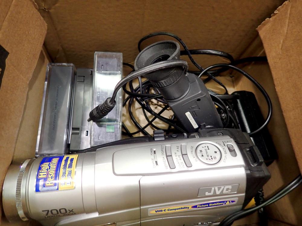 JVC VHS video camera with charger and tapes. Not available for in-house P&P