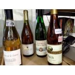 Five white wine bottles. Not available for in-house P&P