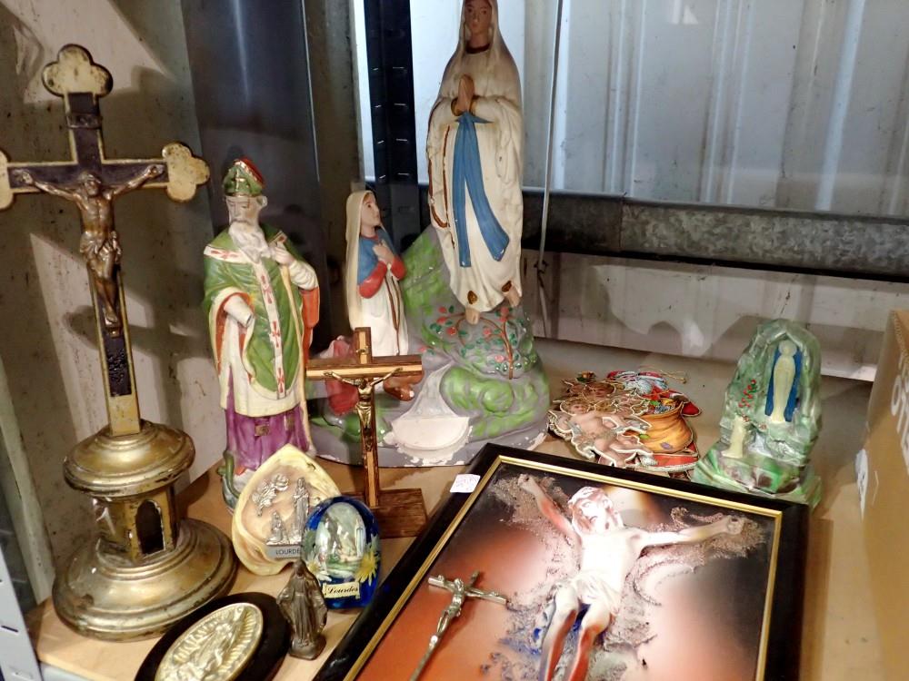 Shelf of mixed religious artifacts to include Lourdes. Not available for in-house P&P