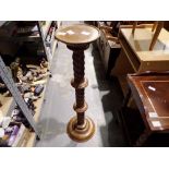Large carved wooden lamp and a wooden plant stand with barleytwist stem. Not available for in-