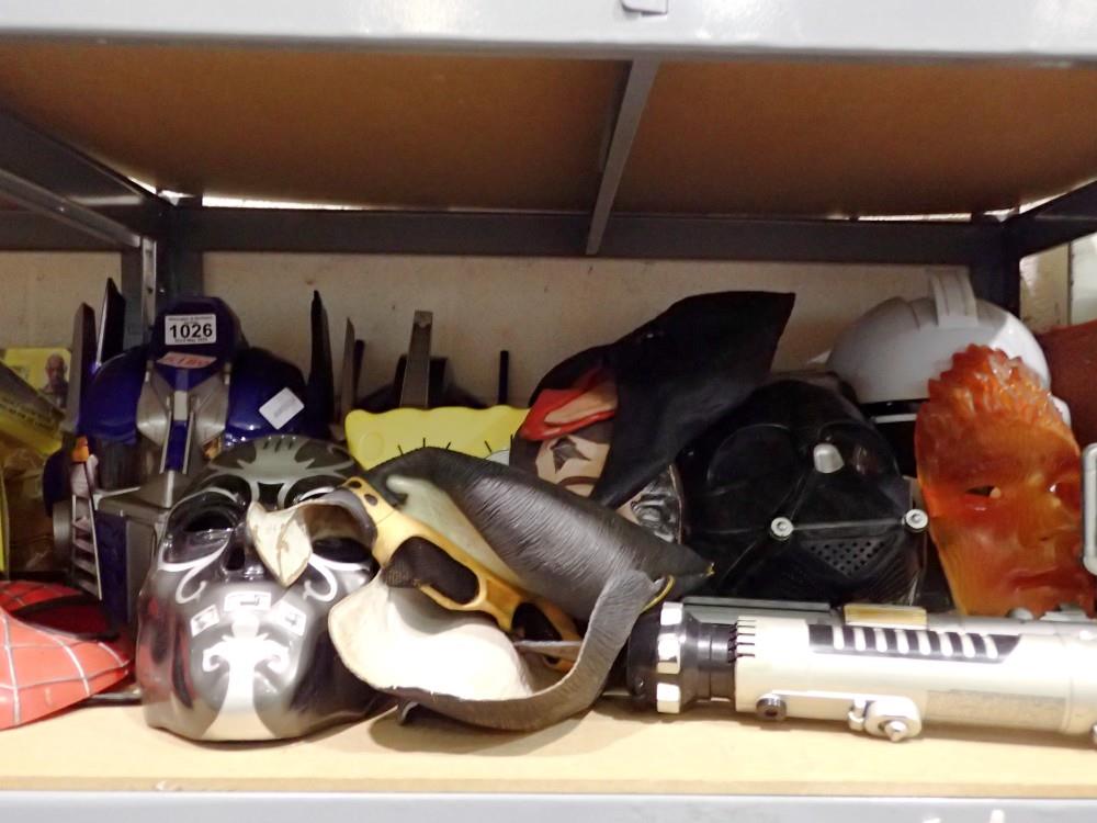 Shelf of character masks, Marvel, Star Wars and Elvis. Not available for in-house P&P
