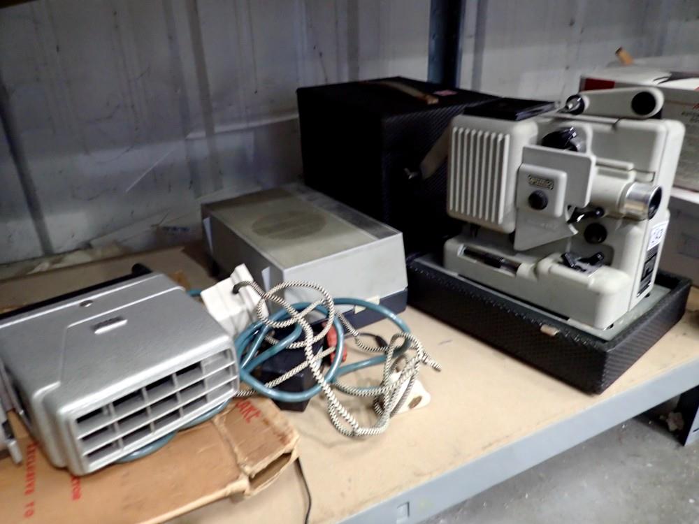 Eumig P8 projector cased with print film projector and miniature Phillips record player. Not