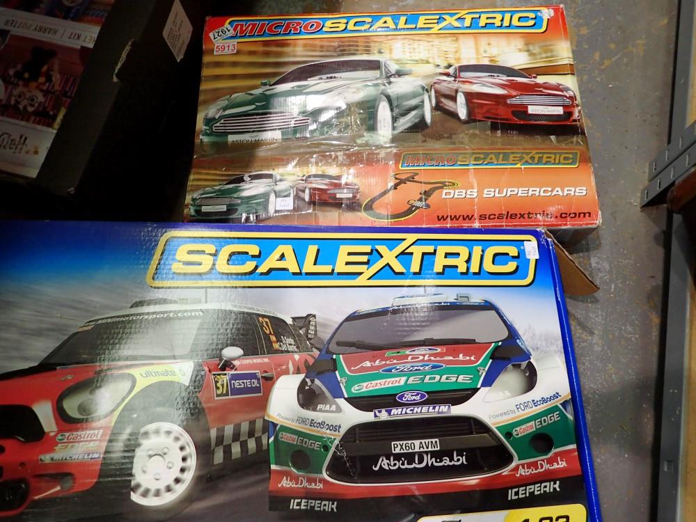 Micro Scalextric (appears complete) and a quantity of Scalextric track. Not available for in-house