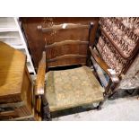 Low oak framed arm chair. Not available for in-house P&P