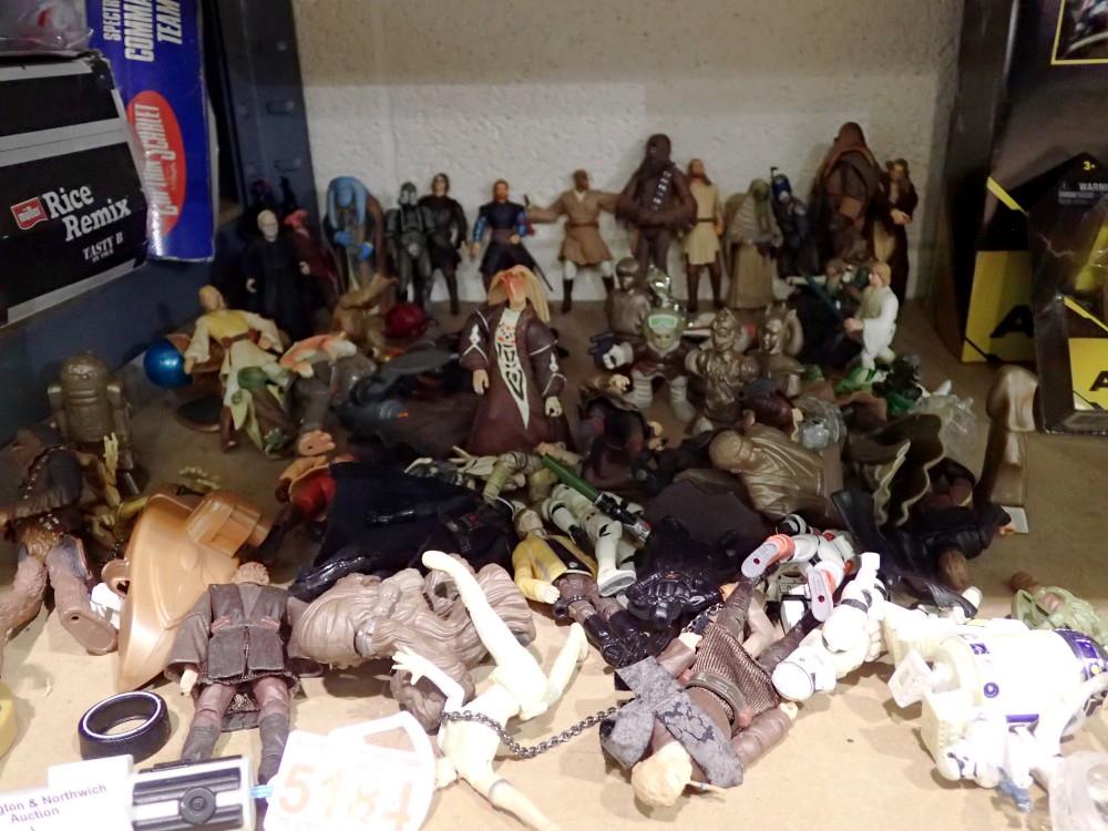 Thirty modern Star Wars Hasbro/Disney figures, appearing in play worn condition. Not available for