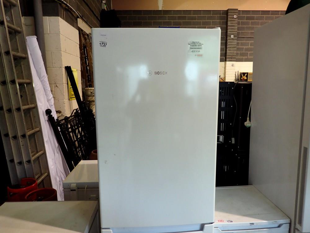 Large Bosch upright fridge freezer. All electrical items in this lot have been PAT tested for safety