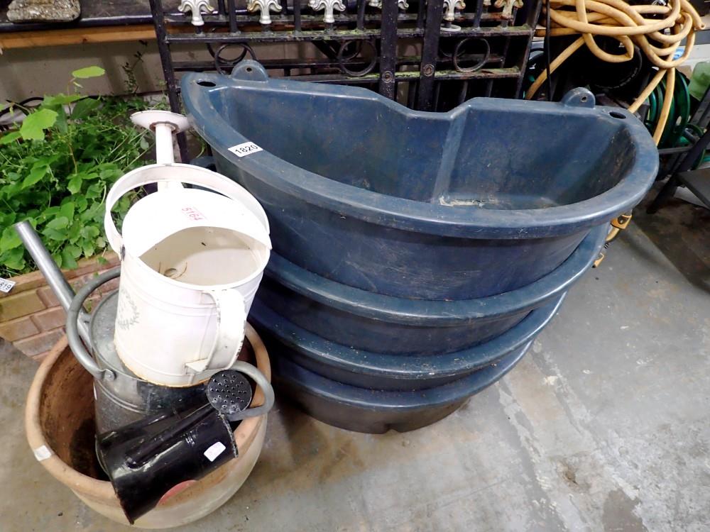 Large terracotta plant pot and three watering cans. Not available for in-house P&P