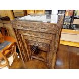 Nest of four Chinese carved hardwood tables. Not available for in-house P&P