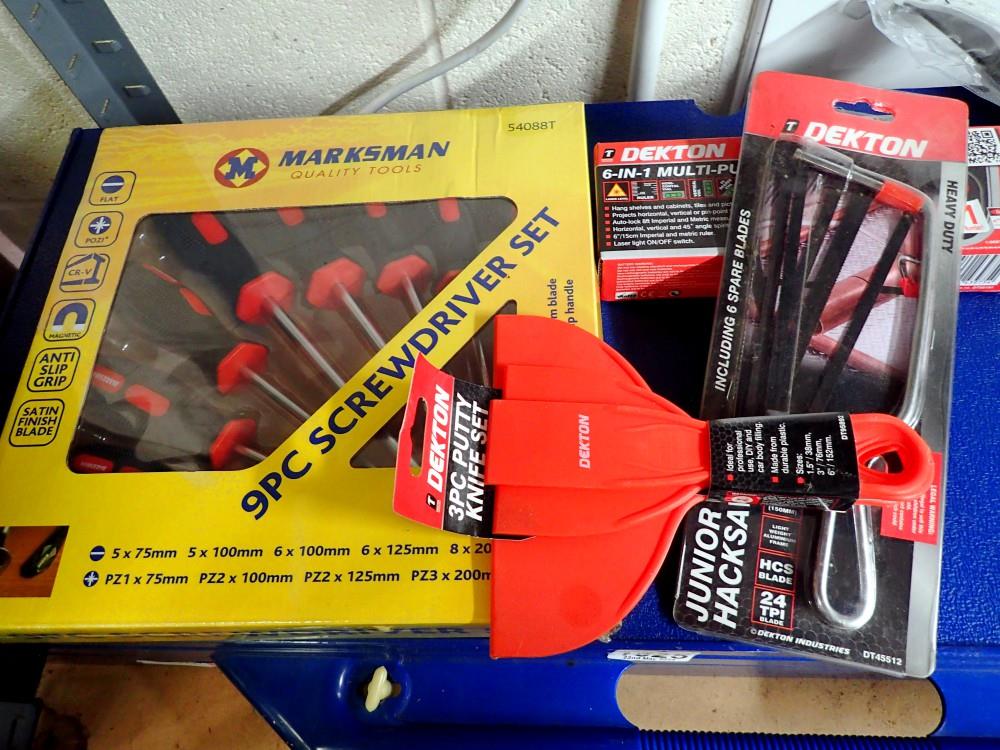 Four Dekton and Marksman tools including bolt cutters and laser level tool. Not available for in-