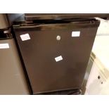 Polar CE322 black mini drinks fridge. This lot is offered for sale on behalf The Brabners Charity