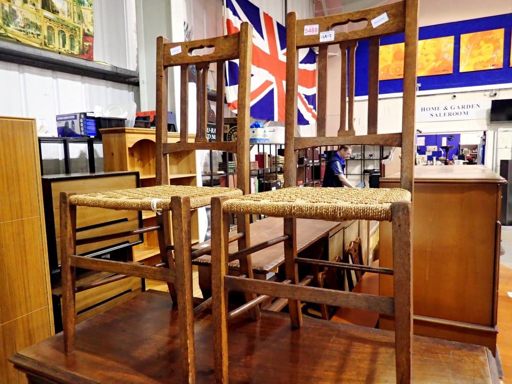 Pair of Edwardian oak dining chairs with strung seats. Not available for in-house P&P