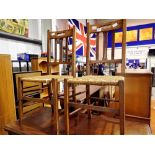 Pair of Edwardian oak dining chairs with strung seats. Not available for in-house P&P