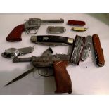 Eight penknives and two toy guns. UK P&P Group 2 (£20+VAT for the first lot and £4+VAT for