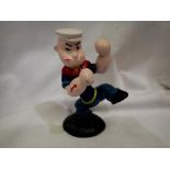 Cast iron Popeye figure. UK P&P Group 1 (£16+VAT for the first lot and £2+VAT for subsequent lots)