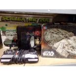 Three boxed games to include a 3D Star Wars puzzle and a Quickshot driving joystick. Not available