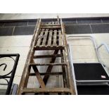 Two sets of tall wooden stepladders. Not available for in-house P&P