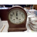 Oak domed chiming mantel clock, with key and pendulum. Not available for in-house P&P