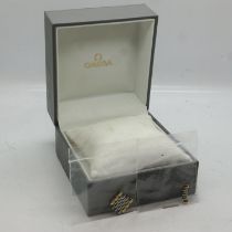 Omega wristwatch box with spare bi-metallic links. UK P&P Group 1 (£16+VAT for the first lot and £