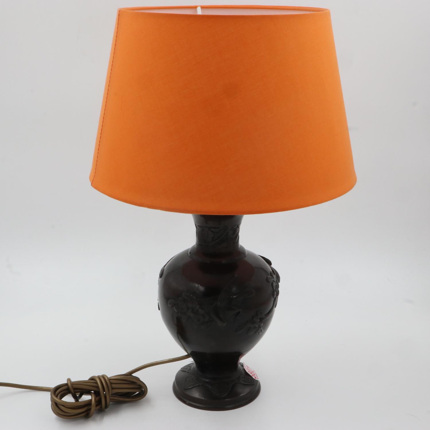 Oriental bronze table lamp with shade, decorated with birds and cherry blossom, H: 53 cm. All