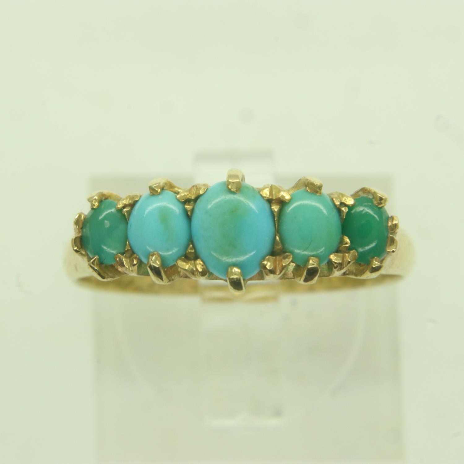 18ct gold five-stone ring set with graduating turquoise, dated 1916 to the shank, size P, 2.6g. P&