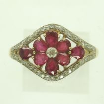 Modern 9ct gold ring set with rubies and diamonds, size T, 3.1g. UK P&P Group 0 (£6+VAT for the