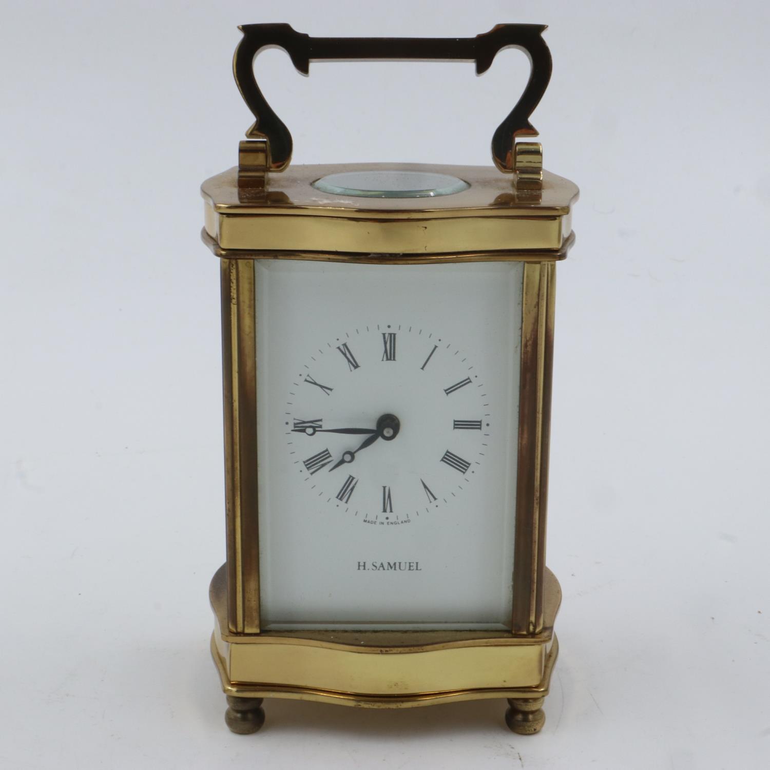 H Samuel brass cased carriage clock, H: 12 cm. UK P&P Group 2 (£20+VAT for the first lot and £4+