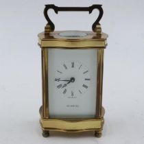 H Samuel brass cased carriage clock, H: 12 cm. UK P&P Group 2 (£20+VAT for the first lot and £4+
